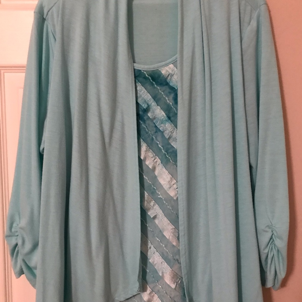 Women’s blouse. Mock cardigan. Light green.